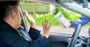 man being subjected to breath test